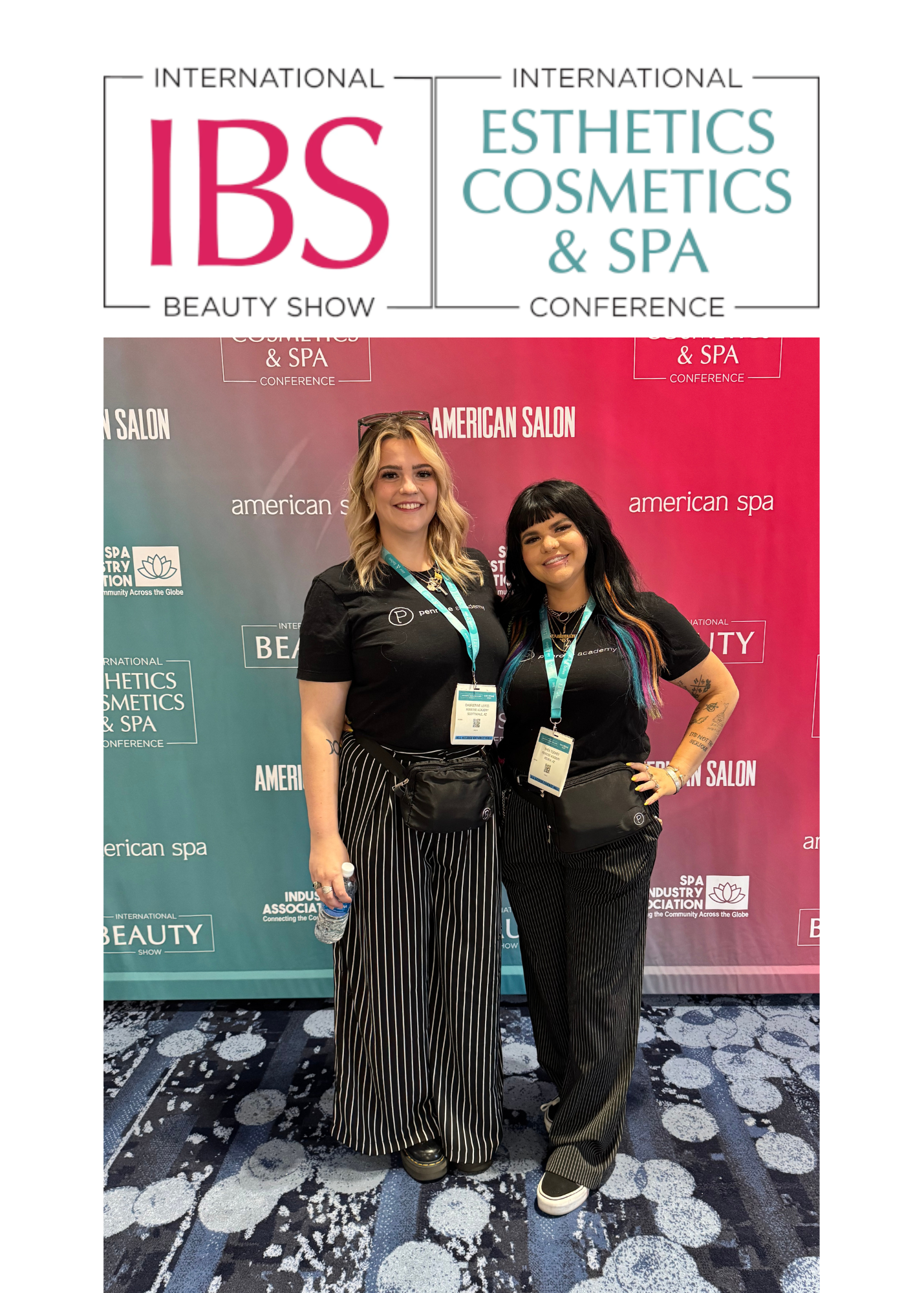 Two women posing at the International Beauty Show (IBS) and International Esthetics Cosmetics & Spa Conference with branded backdrop displaying American Salon and American Spa logos