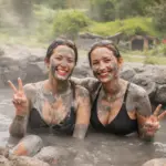 2 women in a mud bath 